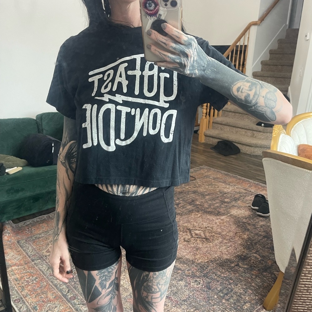 Medium black crop top. Go fast don’t die.